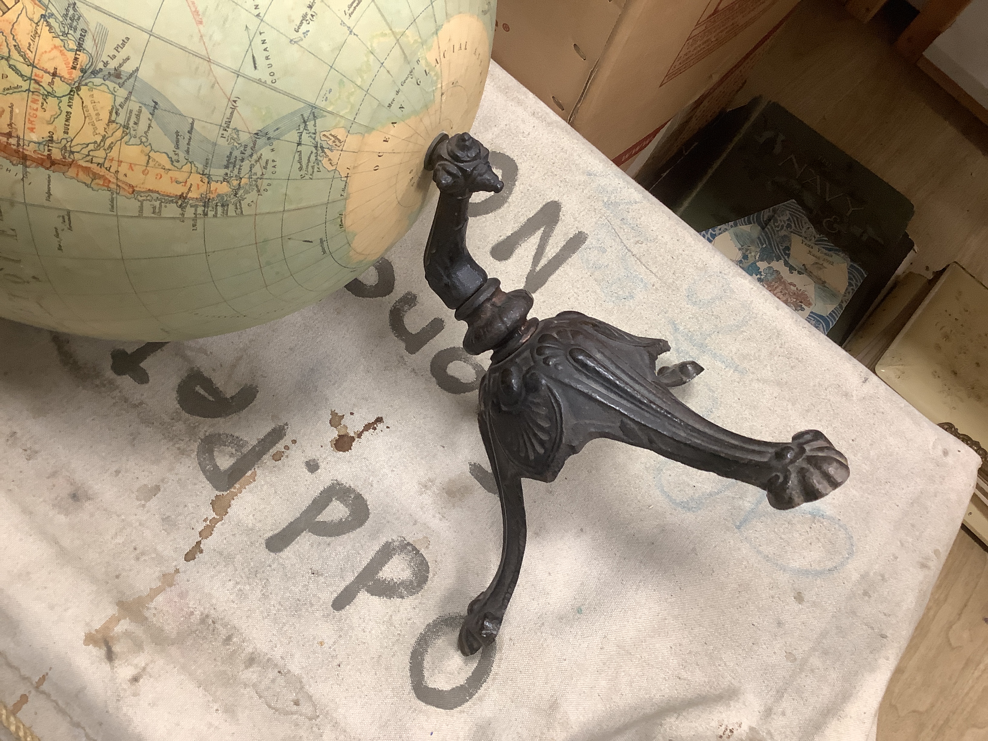 A French physical globe, on cast metal stand, c.1920, 60cm high (Petrograd 1914-24)
